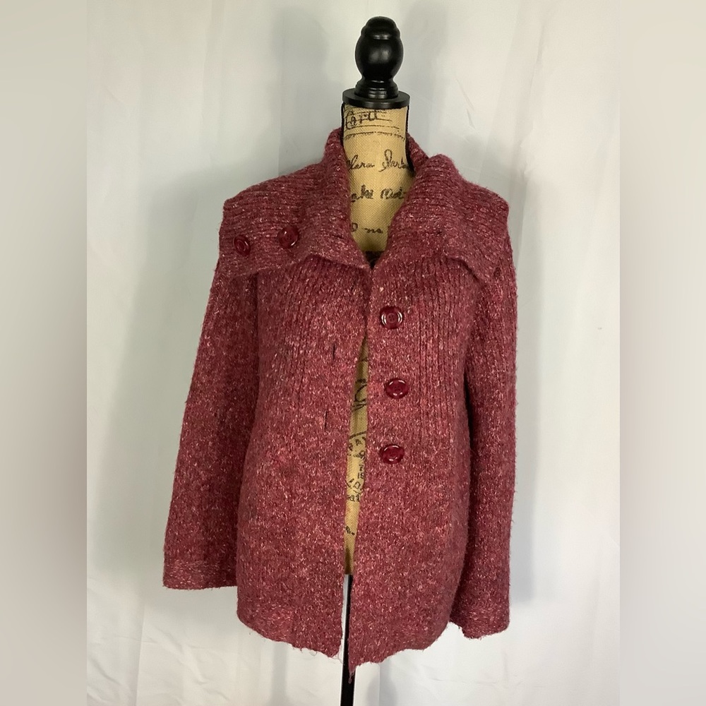 Sweater with buttons.